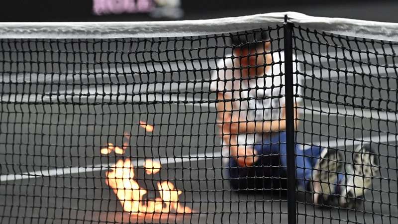 Laver Cup protest as private jets protester sets arm alight on day of final match of Federer career