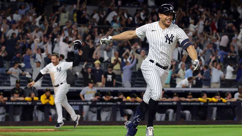 Judge hits 60th home run in dramatic Yankees comeback, Lindor lifts the Mets with grand slam